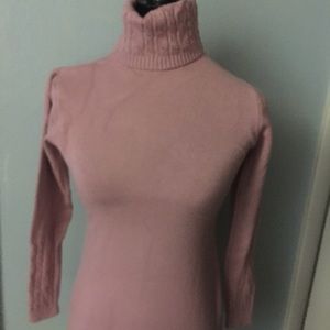 Pink  sweater with cable accents
